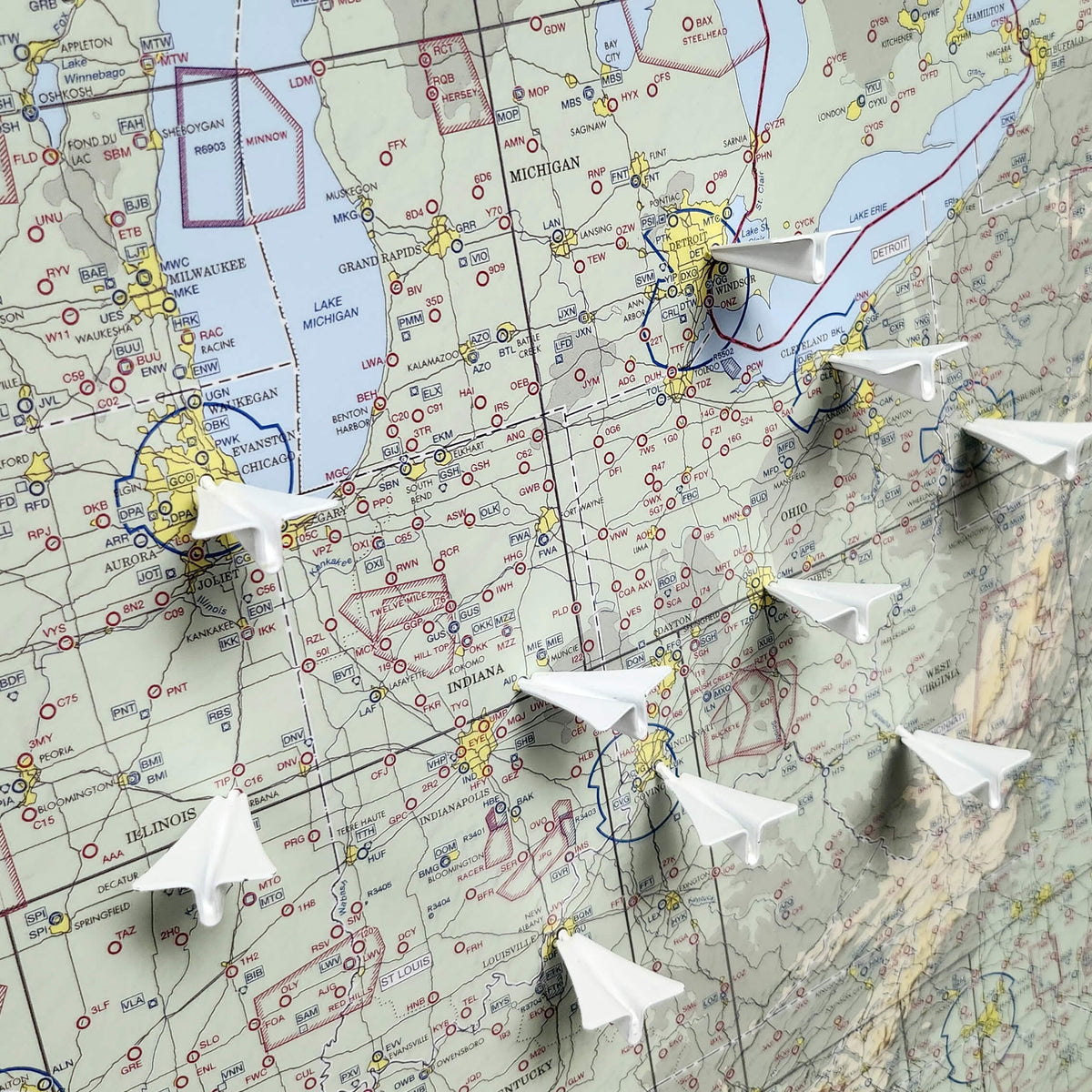 White Metal Paper Plane Push Pins shown on VFR Pilots USA Wall Map