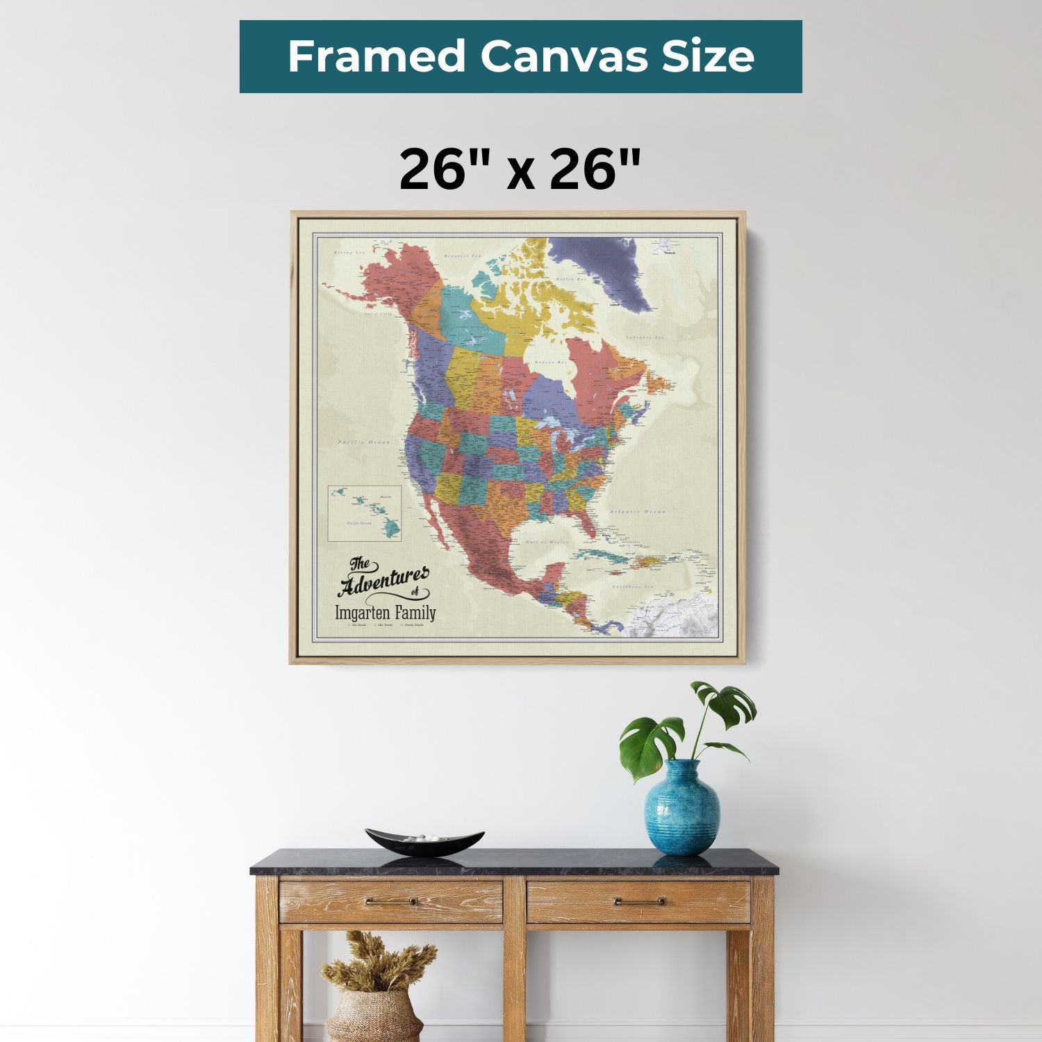 26x26 inch framed canvas North America travel map with pins hanging above wooden console table
