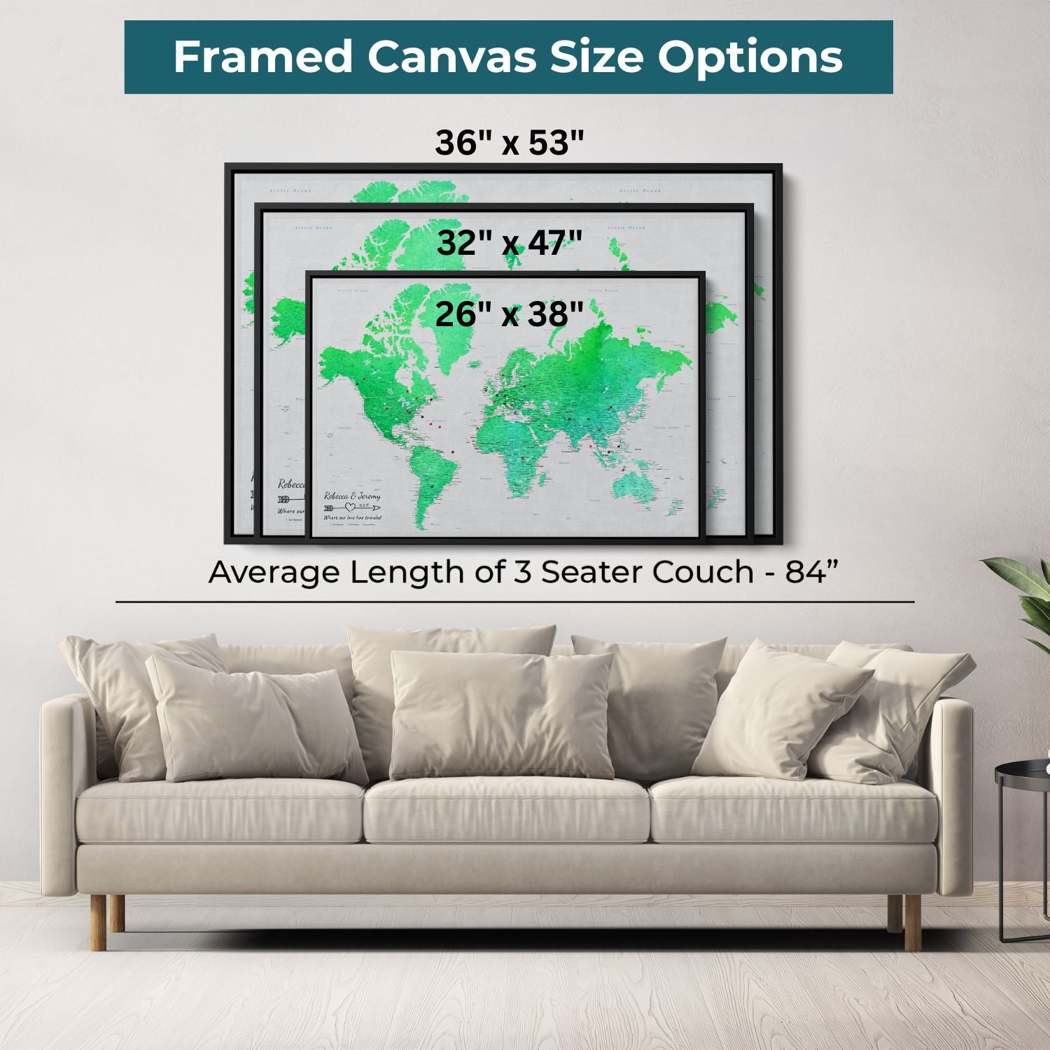 Three black framed emerald watercolor world map canvas size options displayed above beige sofa