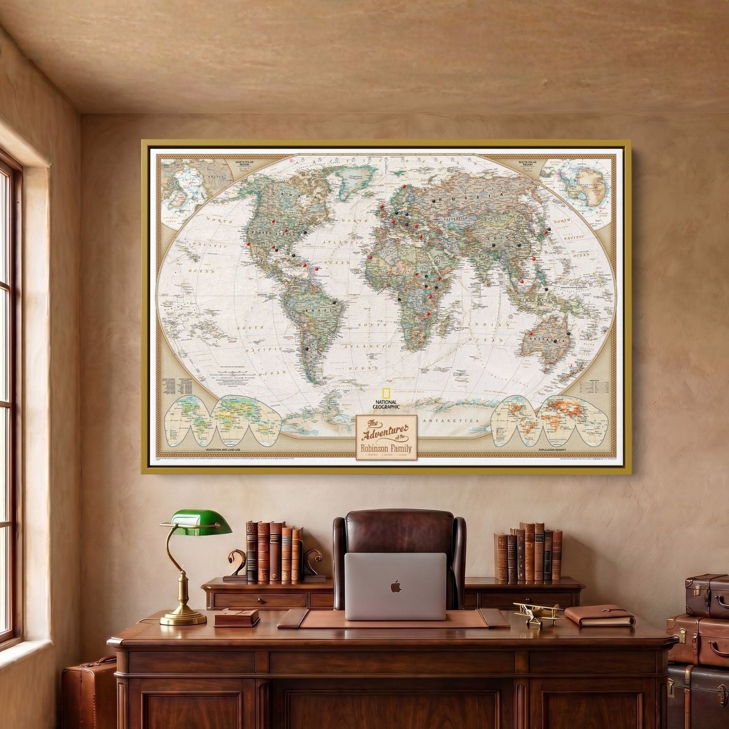 Framed canvas executive world travel map in Gold frame with red and black pins hung above desk