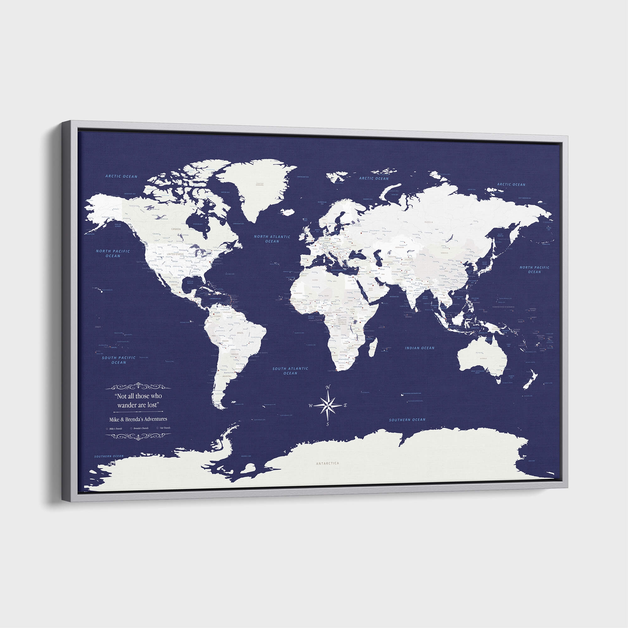 Navy Explorers world travel map canvas with push pins in silver float frame angled view