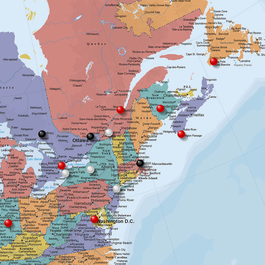 Close-up of canvas Blue Oceans North America travel map with red black and white location pins marking cities across eastern Canada and northeastern United States