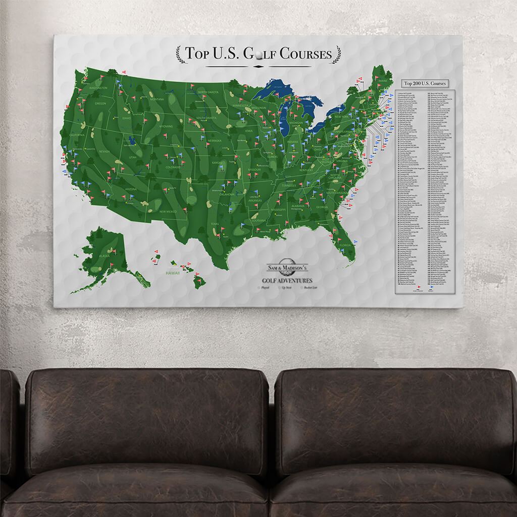 Personalized Top US Golf Courses canvas map with pins displayed above dark leather sofas