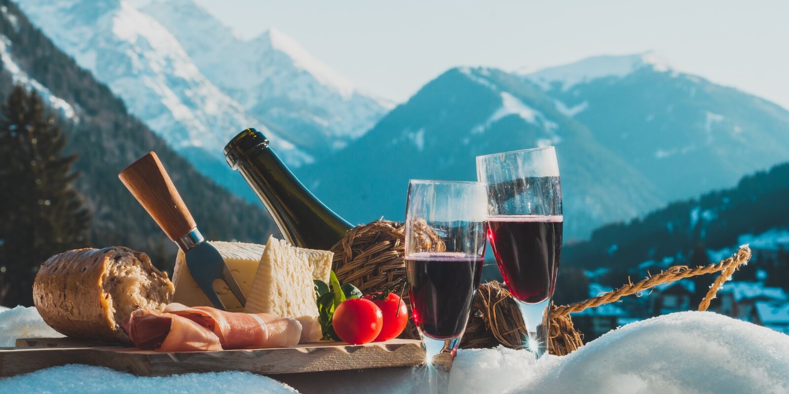 Outdoor winter picnic in italian countryside with mountains view
