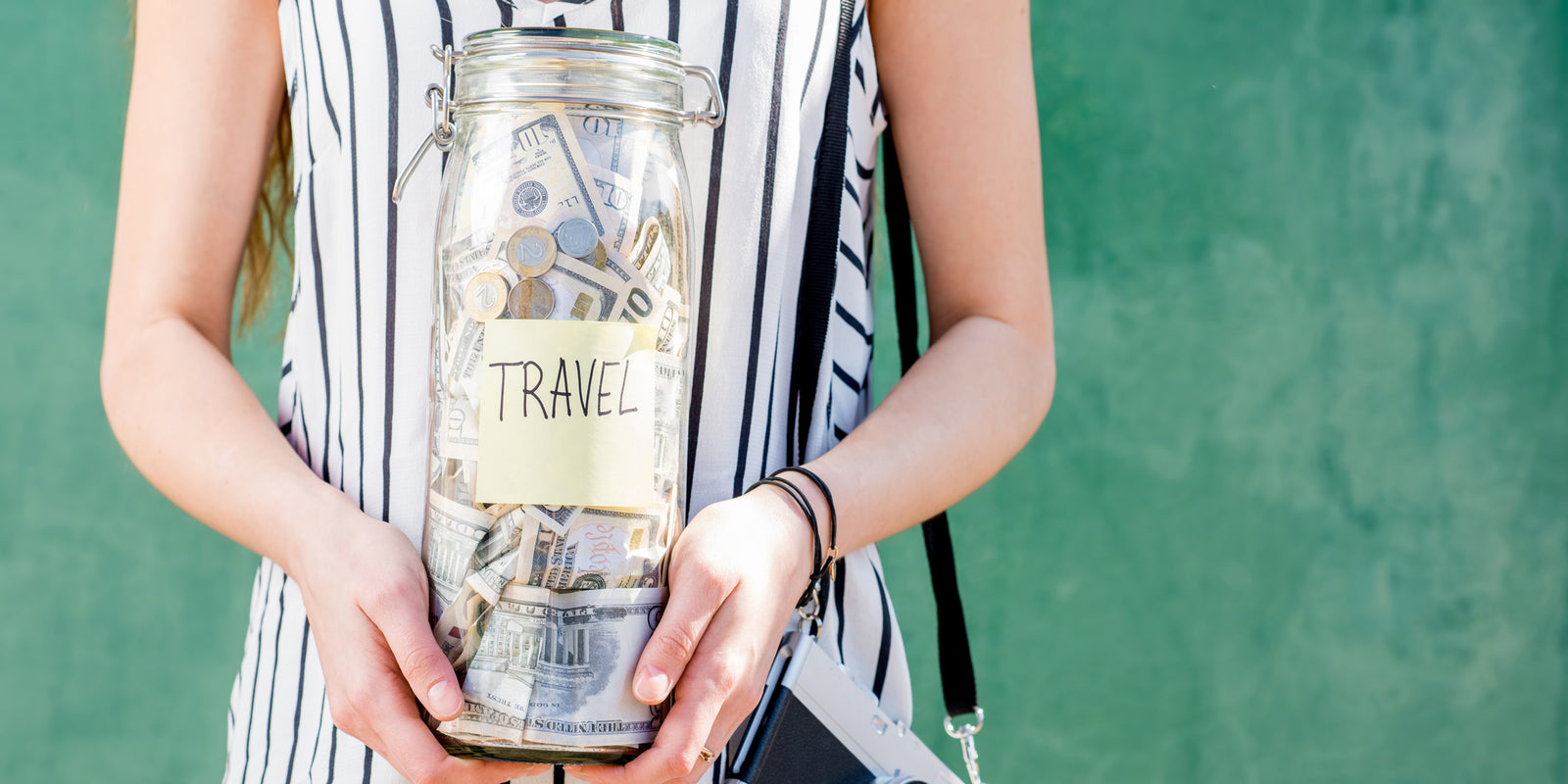 Woman holding travel jar