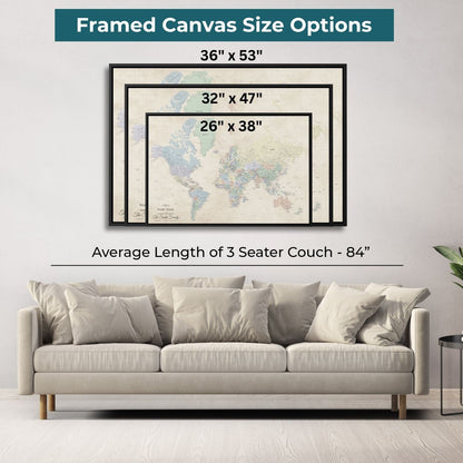 Three size options of Sandy Dreams World Travel Map canvas displayed above neutral living room sofa showing 26x38 32x47 and 36x53 inch framed options