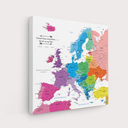 Colorful Europe travel map canvas gallery wrap angled view showing vibrant multicolor countries with pin tracking quote