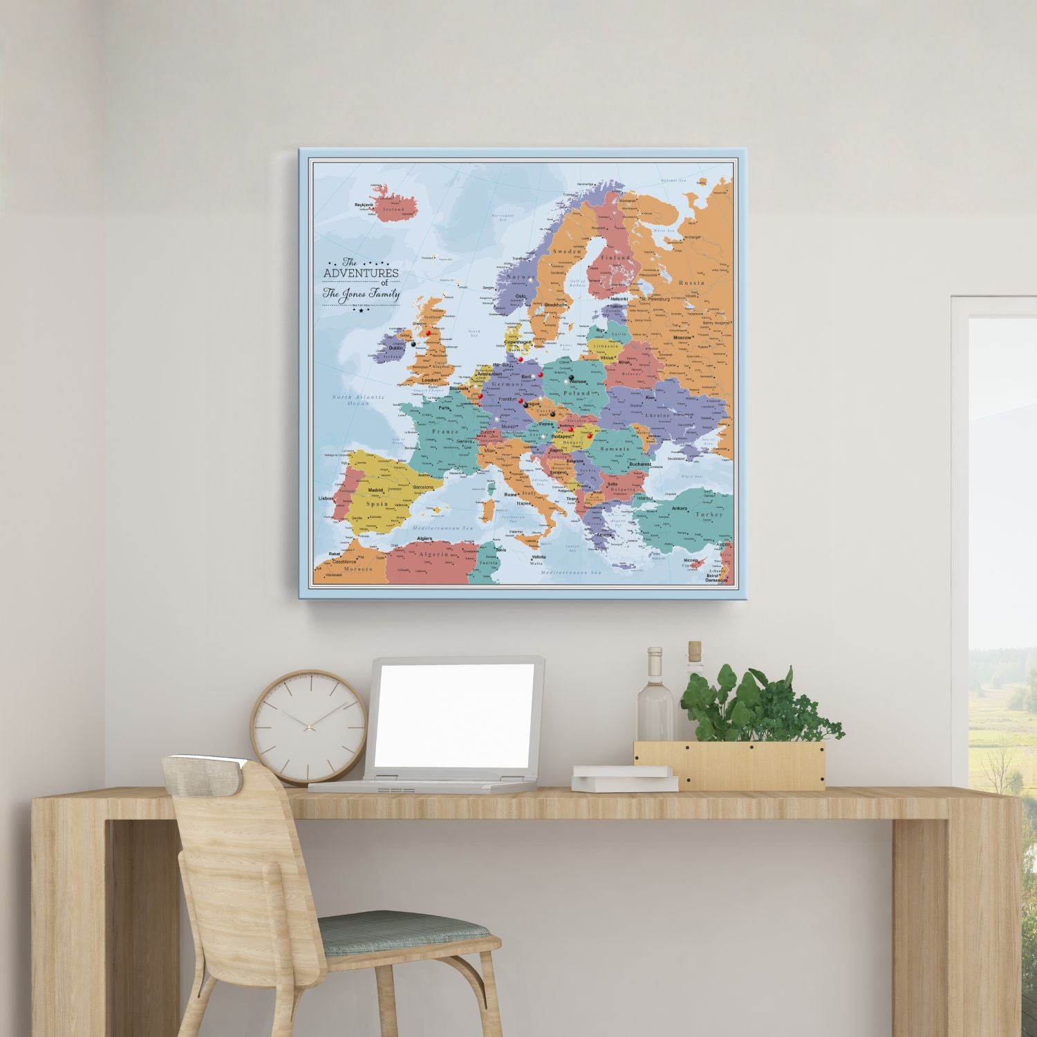 Personalized blue oceans Europe travel map with pins displayed above a modern wooden desk