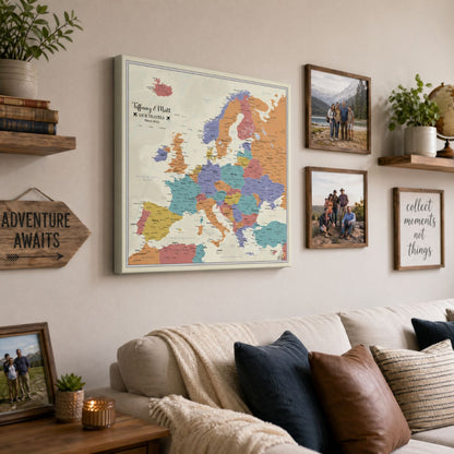 Personalized Europe push pin travel map canvas displayed in cozy living room gallery wall