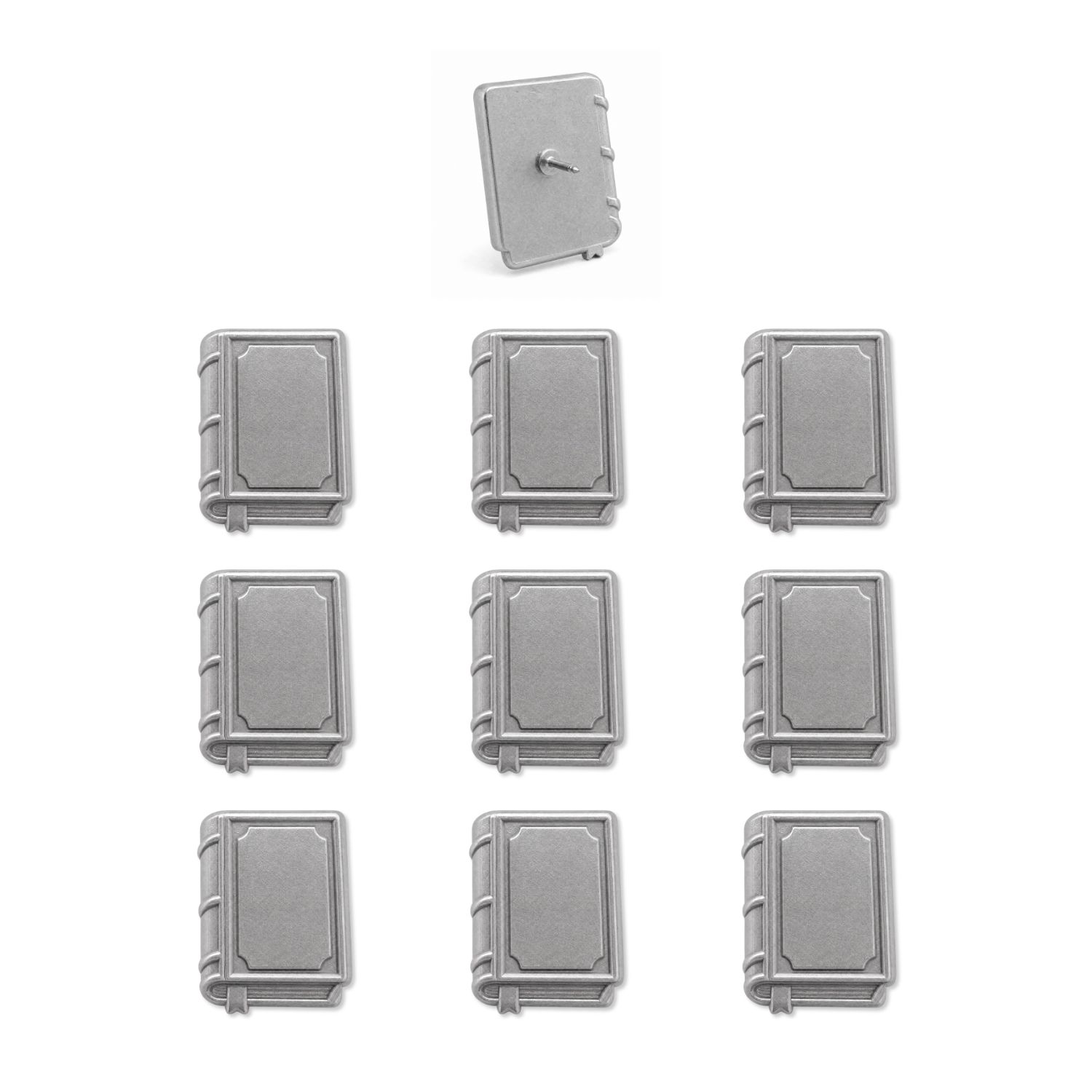 Set of nine silver book-shaped push pins with one showing pin backing on white background