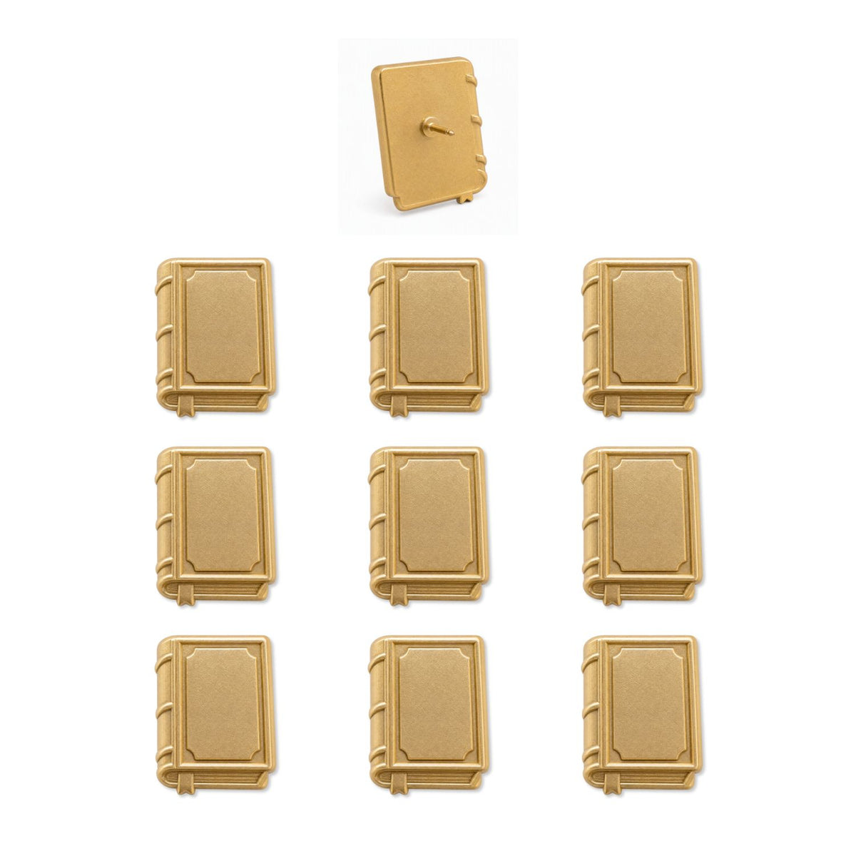 Set of nine matte gold 3D metal book-shaped push pins with embossed covers and spine details