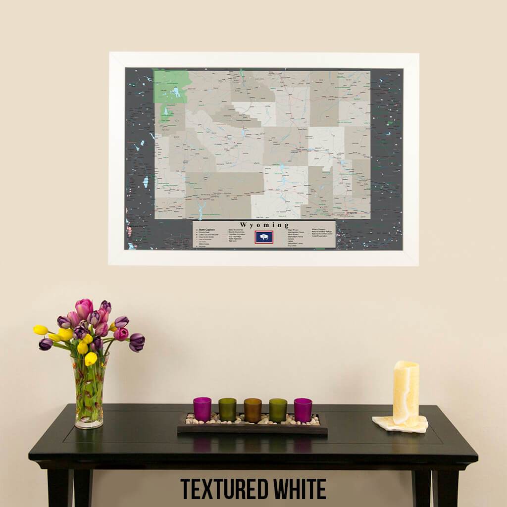 Framed Earth Toned Pin Map of Wyoming Textured White Frame