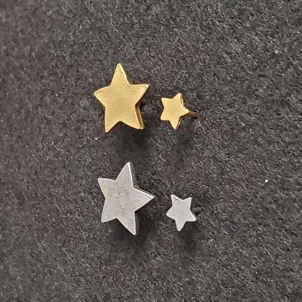 Side View of Gold and Silver Big and Mini Stars